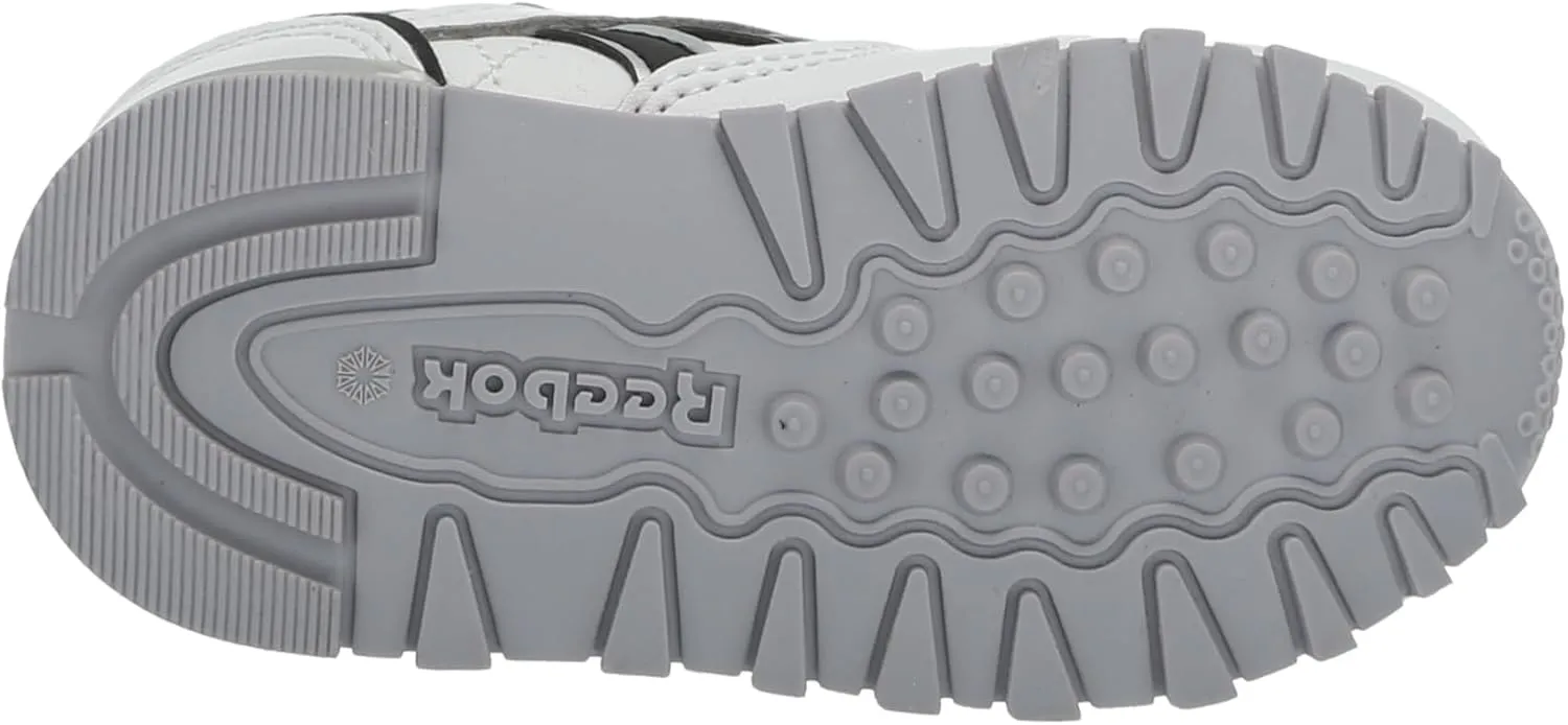 Reebok Unisex-Baby Classic Leather Step N Flash Sneaker