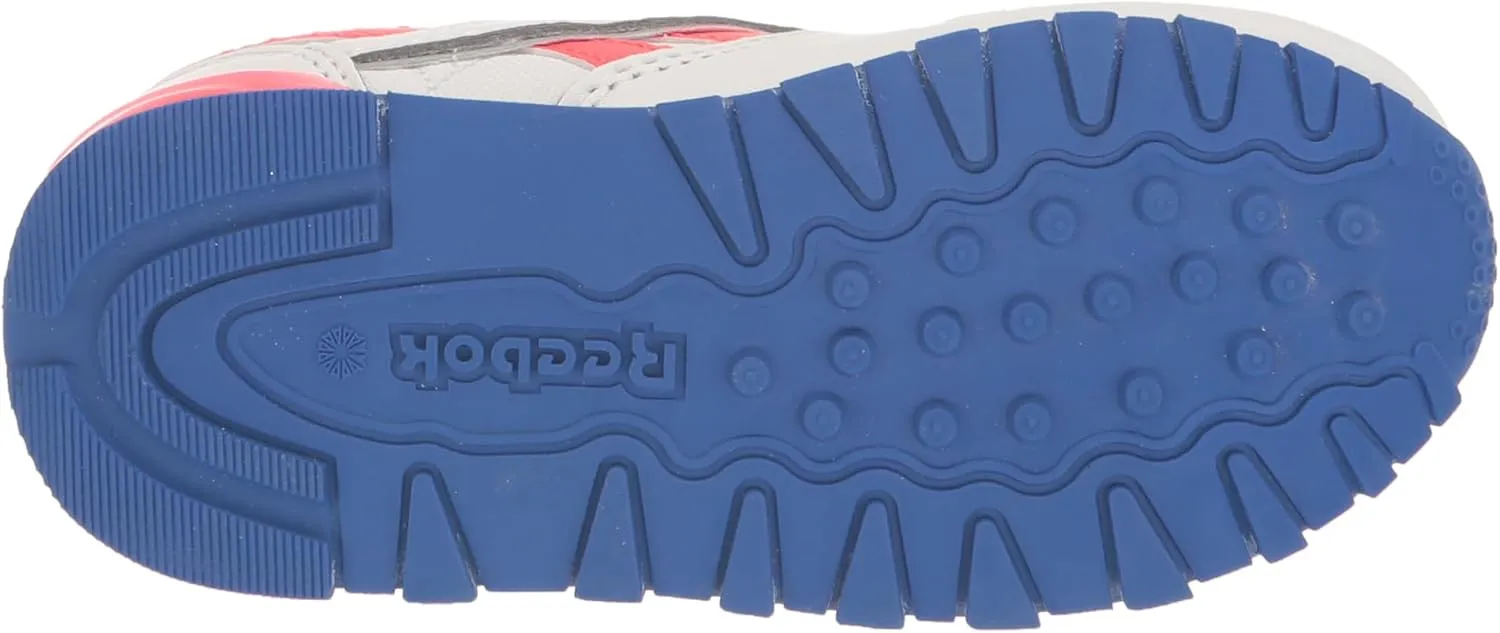 Reebok Unisex-Child Classic Leather Step N Flash Sneaker