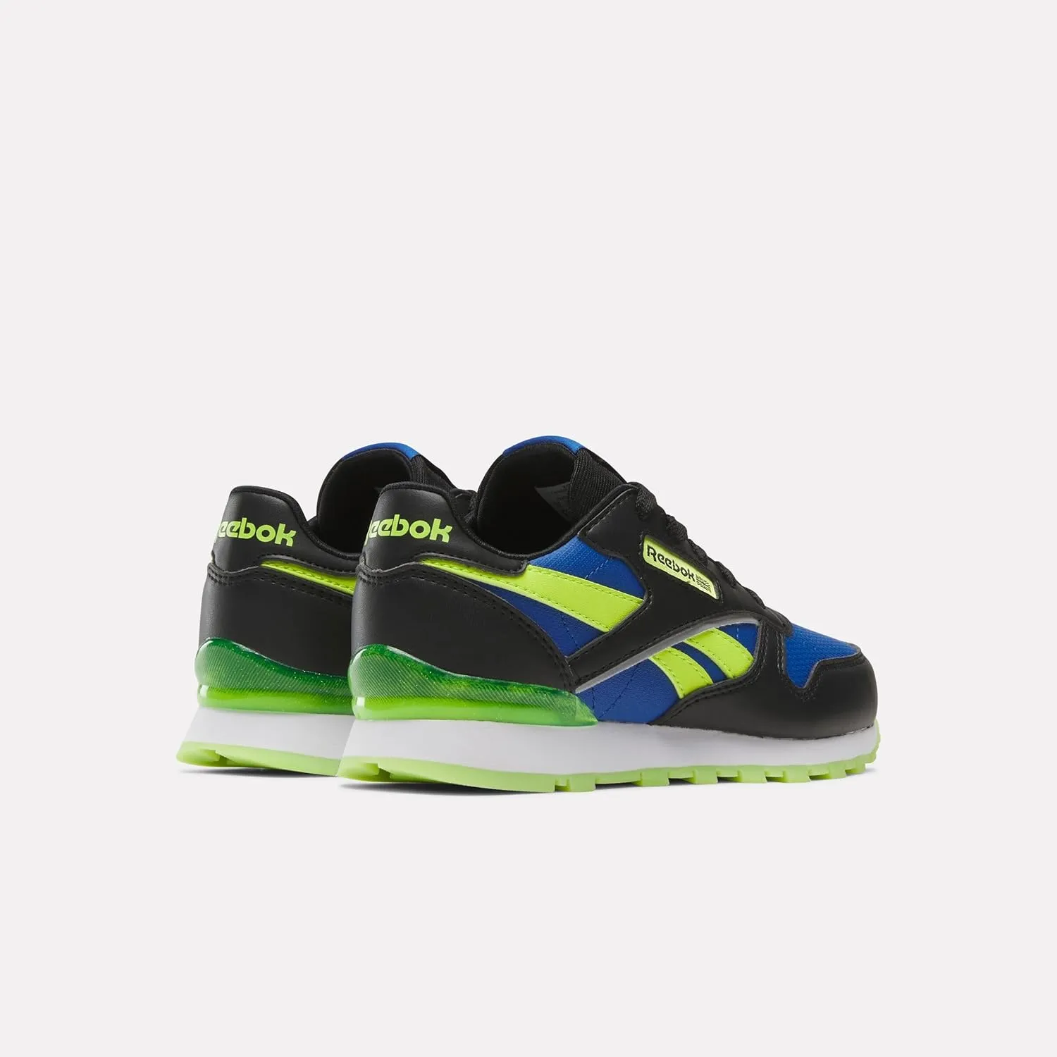 Reebok Unisex-Child Classic Leather Step N Flash Sneaker